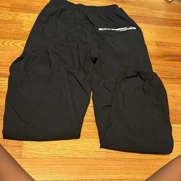 New Balance Black Athletic Pants
Used 
Wind pant material - Picture 4 of 4